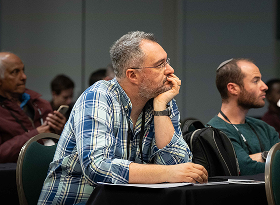 Conferees listen to a speaker at an MD&M conference session
