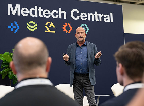 Attendees listen to the speaker on the Medtech Central stage