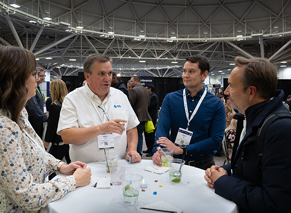 Guests enjoy a conversation during the MD&M Midwest Welcome Reception