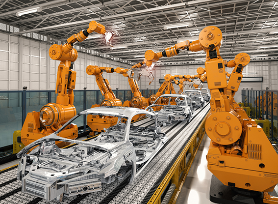 Robotic arms assemble car bodies on an automated production line inside a modern automotive manufacturing facility.